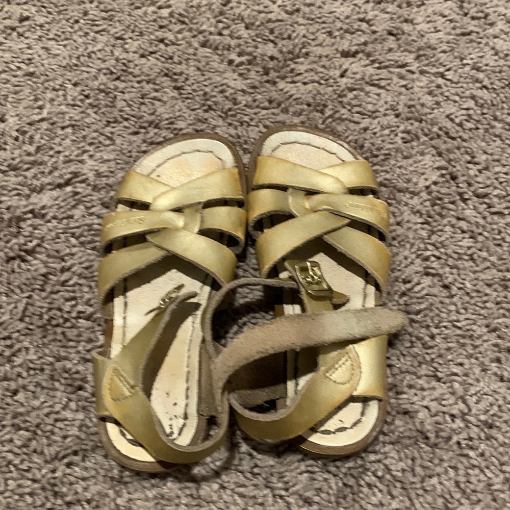 Gold flip flops